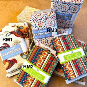 May include: A collection of colorful fabric squares with various patterns, including roosters, stripes, and circles. Each square is labeled with "1 Yard Fabric Cut" and "100% Cotton". The squares are arranged in a pile with the labels facing up. The price of each square is labeled with "RM1", "RM2", and "RM3".