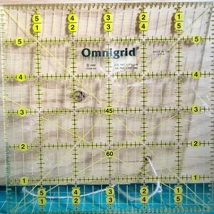 Rotary cutter Ruler by Omnigrip, used. 5" x  5". Used condition. Quilting and Sewing