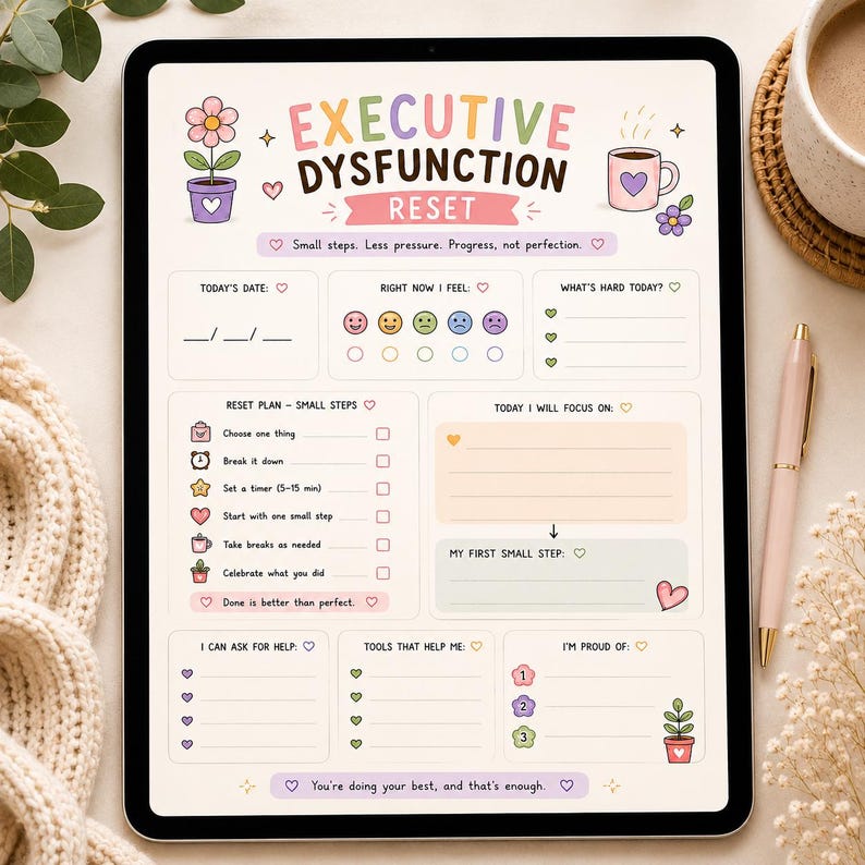 May include: A digital tablet displaying an Executive Dysfunction Reset planner template. The page features pastel-coloured sections for tracking daily tasks, moods, and goals, decorated with small illustrations of flowers, a coffee mug, and hearts.