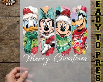 May include: A DTF transfer sheet featuring four vertical panels of cartoon characters in Christmas attire, including Donald Duck, Minnie Mouse, Mickey Mouse, and Goofy, with the white cursive text Merry Christmas printed below the characters.
