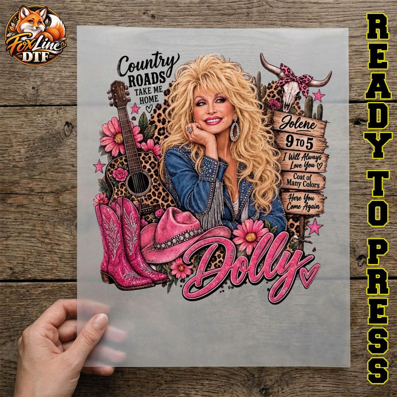 May include: A DTF transfer sheet featuring a blonde woman in a denim jacket, a guitar, pink cowboy boots, a pink hat, and a cow skull. Text includes Country Roads Take Me Home, Jolene, 9 to 5, I Will Always Love You, Coat of Many Colors, Here You Come Again, and Dolly.