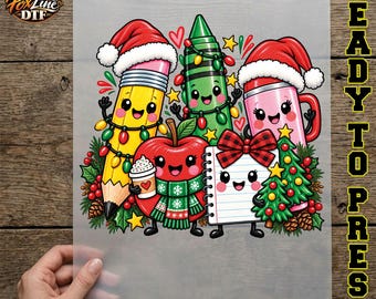 May include: A DTF transfer sheet featuring a festive cartoon illustration of a yellow pencil, a green crayon, a pink mug, a red apple, and a white notepad, all with smiling faces, wearing Santa hats, and decorated with Christmas lights.