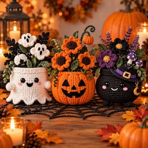 May include: Three crocheted Halloween decorations: a white ghost pot with ghost flowers, an orange jack-o'-lantern pot with orange flowers, and a black cauldron pot with purple flowers, a witch hat, and a gold crescent moon charm.