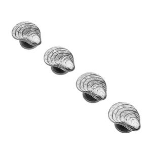 May include: Four silver oyster shell drawer pulls. Each pull is a detailed replica of an oyster shell.
