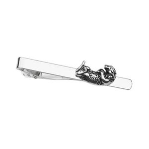 May include: A silver tie bar with a detailed sea otter design. The otter is depicted in a curled up position.