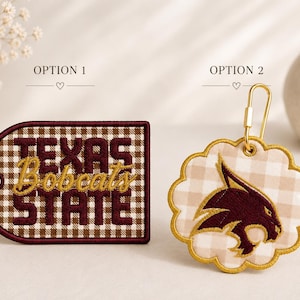 May include: Two embroidered keychains. Option 1 is a rectangular tag with rounded edges, featuring a brown and white gingham pattern and the text 'TEXAS STATE' in maroon and gold. Option 2 is a scalloped circular tag with a gold carabiner.