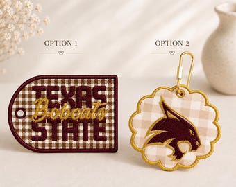 May include: Two embroidered keychains. Option 1 is a rectangular tag with rounded edges, featuring a brown and white gingham pattern and the text 'TEXAS STATE' in maroon and gold. Option 2 is a scalloped circular tag with a gold carabiner.