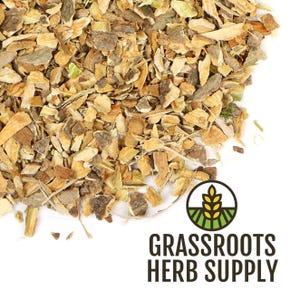 May include: Close-up of a pile of dried, chopped herbs. The herbs are primarily brown and tan, with some green and gray pieces. The image includes the text "GRASSROOTS HERB SUPPLY" with a logo of a wheat stalk.