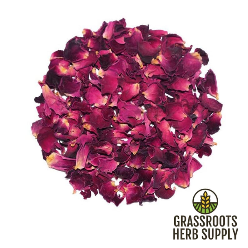 May include: A close-up of a pile of dried rose petals. The petals are a deep pink color and have a slightly wrinkled texture. They are perfect for adding a touch of natural beauty to your crafts, bath products, or tea blends.