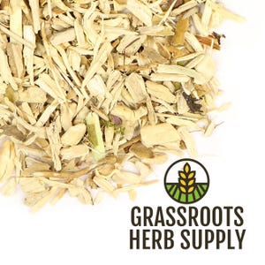 May include: Close-up of a pile of light beige, dried herbs and roots. The image features a variety of shapes and sizes, with some pieces appearing like small sticks or chips. The logo for Grassroots Herb Supply is in the bottom right corner.