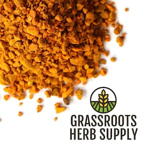 May include: Close-up of a pile of bright orange-yellow, granular herbs. The image features the logo for Grassroots Herb Supply, a circular design with a wheat stalk and the words "Grassroots Herb Supply".