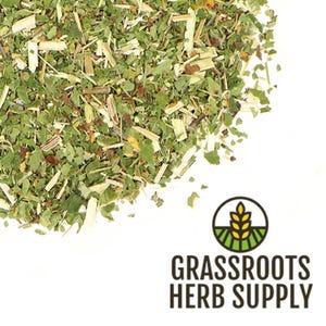 May include: A close-up of a pile of dried herbs, including green leaves and stems. The herbs are loose and appear to be a blend of different types. The image is labeled "GRASSROOTS HERB SUPPLY".