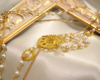 Gleaming Gold and Pearl Chandelier Necklace