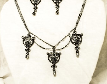 Blackhearts filigree steampunk inspired necklace and matching earrings