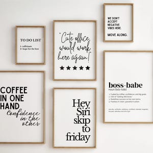 May include: A collection of framed wall art with gold frames and white backgrounds. The art features black text with motivational quotes and phrases like "Coffee in one hand, confidence in the other" and "Boss Babe".
