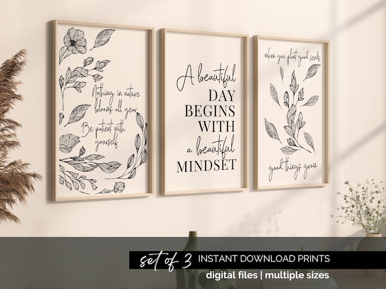 Puede incluir: Conjunto de tres impresiones de arte de pared imprimibles con ilustraciones florales en blanco y negro y citas inspiradoras. Las citas son "Nada en la naturaleza florece todo el a&ntilde;o. S&eacute; paciente contigo mismo", "Un d&iacute;a hermoso comienza con una hermosa mentalidad", y "Cuando plantas buenas semillas, crecen cosas buenas."