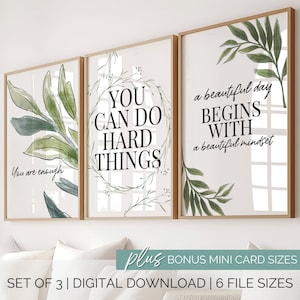 May include: Set of three printable wall art prints with green watercolor leaves and inspirational quotes. The quotes are "You are enough", "You can do hard things", and "A beautiful day begins with a beautiful mindset".