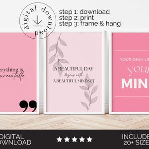 May include: Three framed pink wall art prints with white borders. The prints feature inspirational quotes in black text. One says "everything is figureoutable", another says "A beautiful day begins with a beautiful mindset", and the last says "Your only limit is your mind".
