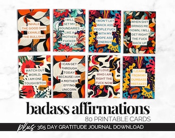 May include: A collection of eight colorful affirmation cards with bold text and floral designs. The cards feature phrases like "Inhale the good shit, exhale the bullshit" and "I will set my boundaries like a mother f*cker." The words "badass affirmations" are displayed below.