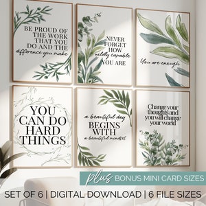 May include: Set of six printable wall art prints with inspirational quotes and watercolor greenery. The quotes include "Be proud of the work that you do and the difference you make", "Never forget how wildly capable you are", "You are enough", "You can do hard things", "A beautiful day begins with a beautiful mindset", and "Change your thoughts and you will change your world".