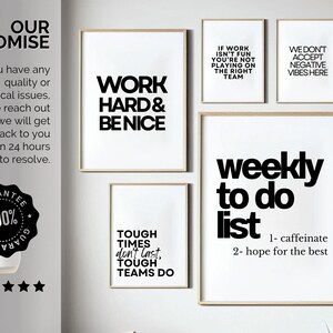 May include: A set of framed art prints featuring black text on white backgrounds. The prints display motivational quotes such as "Work Hard & Be Nice" and "Weekly To Do List." The frames have a light wood finish.