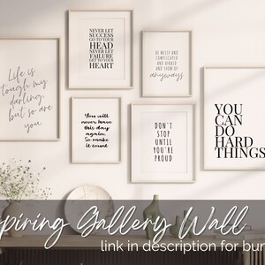 May include: A gallery wall with six inspirational quotes printed on white paper with black text. The quotes are: "Never let success go to your head. Never let failure get to your heart." "Be messy and complicated and afraid and show up anyways." "Life is tough my darling, but so are you." "You will never have this day again. So make it count." "Don't stop until you're proud." "You can do hard things."