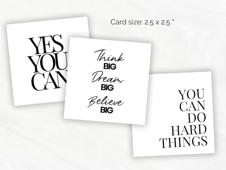 May include: Three white cards with black text. The first card says "YES YOU CAN". The second card says "Think BIG Dream BIG Believe BIG". The third card says "YOU CAN DO HARD THINGS".