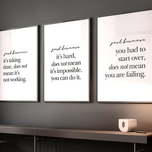 May include: Three framed prints with motivational quotes in black script on a white background. The quotes read: "Just because it's taking time, does not mean it's not working." "Just because it's hard, does not mean it's impossible. You can do it." "Just because you had to start over, does not mean you are failing."