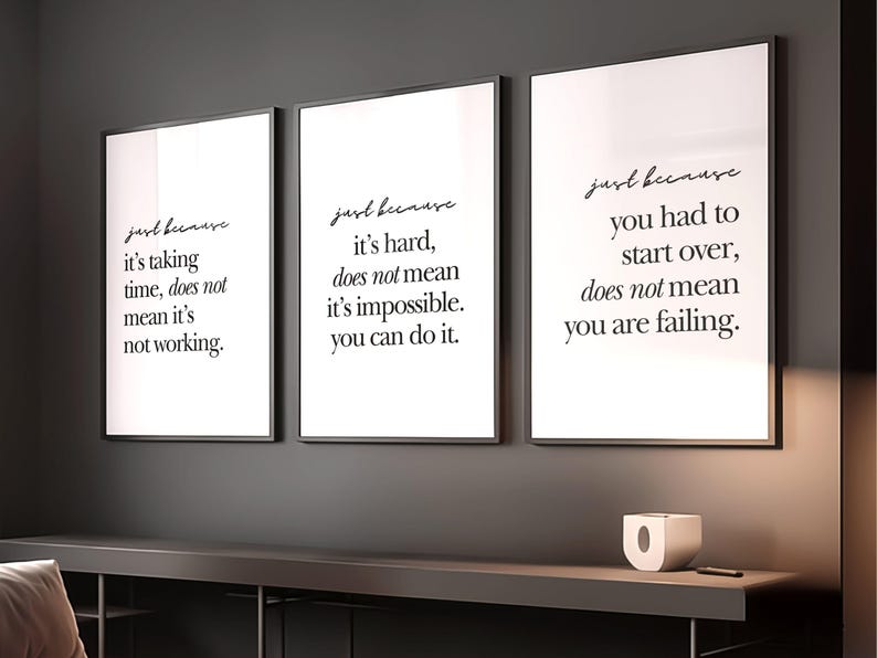 May include: Three framed prints with motivational quotes in black script on a white background. The quotes read: "Just because it's taking time, does not mean it's not working." "Just because it's hard, does not mean it's impossible. You can do it." "Just because you had to start over, does not mean you are failing."