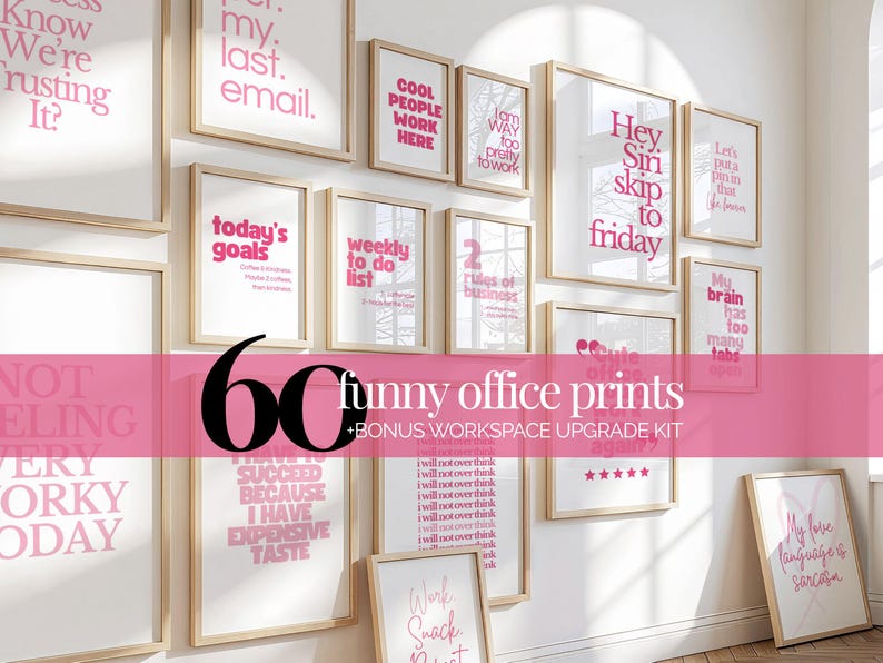 May include: A collection of framed wall art with humorous quotes in pink text on a white background. The frames are light wood. The words include "Today's Goals", "Hey Siri skip to Friday", and "My brain has too many tabs".