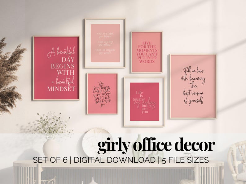 May include: Set of six printable wall art prints with pink backgrounds and black text. The prints feature inspirational quotes such as "A beautiful day begins with a beautiful mindset" and "Life is tough, my darling, but so are you".