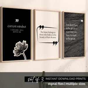 Peut inclure: Ensemble de trois impressions d'art mural imprimables avec des citations inspirantes. La première impression présente une illustration florale en noir et blanc et la citation "current mindset I can and I will watch me". La deuxième impression présente la citation "The future belongs to those who believe in the beauty of their dreams". La troisième impression présente la citation "You don't have to be great to start but you have to start to be great".