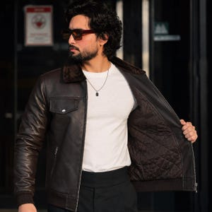 Inside lining of men's dark brown genuine sheep leather quilted jacket