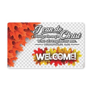 Puede incluir: Un letrero rectangular con un borde de hojas de arce naranjas y rojas a la izquierda y un grupo de hojas amarillas, naranjas y rojas en la parte inferior. El texto dice: I can do all things through Christ who strengthens me. PHILIPPIANS 4:13 WELCOME!