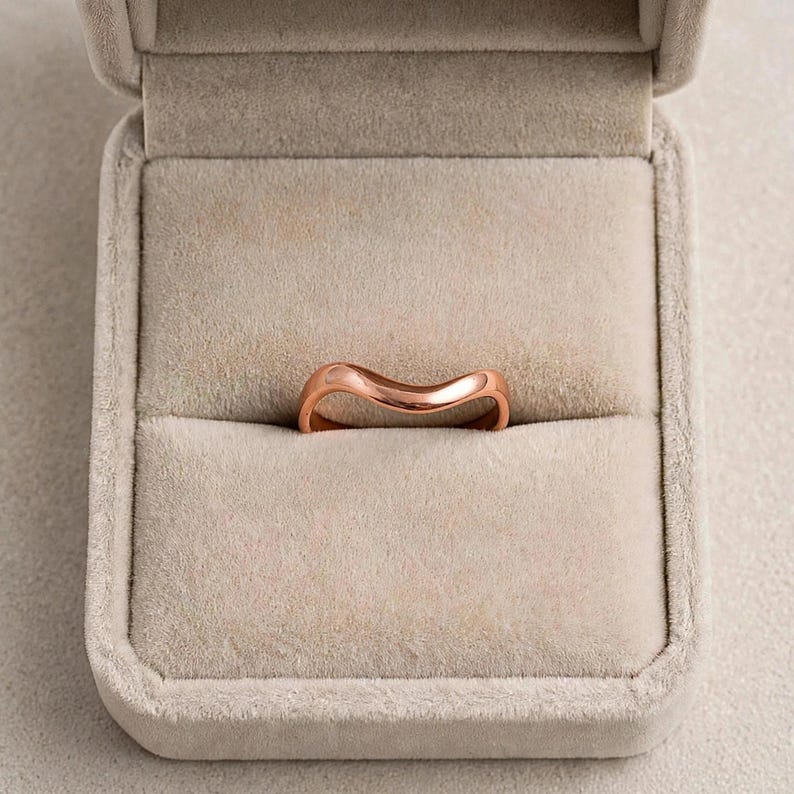 Handmade pure solid copper wave ring in beige velvet ring box display top view gift packaging polished ripple wave design, thin organic wavy bypass contour high mirror shine unplated copper chevron stacking minimalist boho ocean wave wishbone ring solid copper Jaipur artisan handmade luxury jewelry box ready to gift engagement promise proposal gift for her