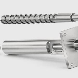 May include: A silver-colored metal industrial component set consisting of a long threaded auger screw, a cylindrical housing with a rectangular mounting flange, and a separate hexagonal nut with internal threading, all featuring a smooth finish.