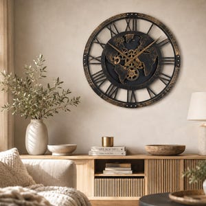 May include: A large round wall clock featuring a black world map silhouette in the center with exposed gold-toned mechanical gears. The clock has a dark bronze-colored outer frame with black Roman numerals and thin black clock hands.