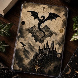 May include: A rectangular tablet case featuring a detailed black and beige illustration of a large dragon flying above a mountain castle. The design includes celestial elements like stars, circular orbits, and a compass rose, all encased in a clear shell.