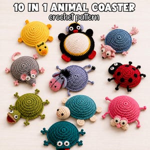 May include: A collection of ten crocheted animal coasters featuring various designs including a yellow turtle, a black and white penguin, a blue mouse, a red ladybug, a green frog, and other colourful creatures with the text 10 IN 1 ANIMAL COASTER crochet pattern.
