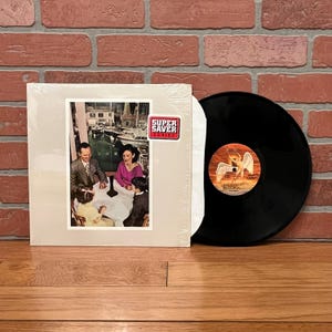 Led Zeppelin Presence Vinyl Record Album LP 1980s SRC Pressing Gatefold In Shrink Hype Stickers Super Saver Jimmy Page Classic Rock Vintage