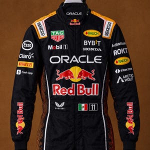 May include: A black racing suit featuring the Oracle Red Bull Racing team branding, including logos for Tag Heuer, Mobil 1, Bybit, Honda, Sparco, and Cash App. The suit displays the Mexican flag and the number 11 on the chest with orange accents.