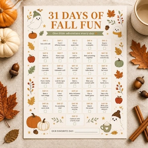 May include: A rectangular paper activity chart titled 31 Days of Fall Fun with a grid of thirty-one daily tasks. The design features illustrations of ghosts, pumpkins, acorns, and autumn leaves in orange, brown, and green on a cream background.