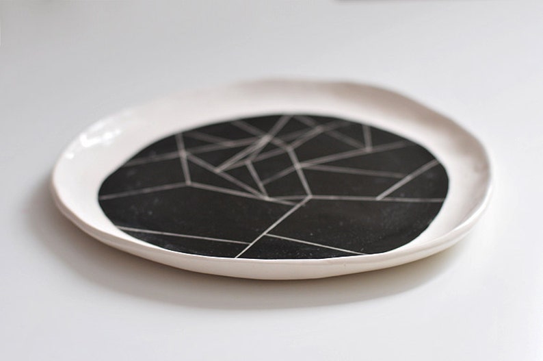 BW white ceramic plate with black geometry ornament abstract pattern contemporary minimalism style black and white