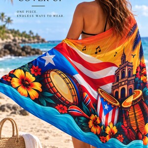 May include: A rectangular beach cover-up featuring a vibrant graphic print of the Puerto Rican flag, tropical hibiscus flowers, musical notes, drums, and a historic building. The fabric displays a gradient of orange, red, and blue colors.