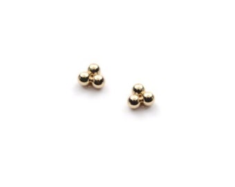 Mini boucles d'oreilles puces dorées à l'or fin 24 quilates / Colección Sphinx pure