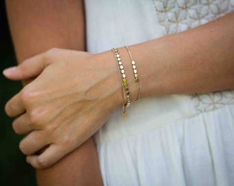 Bracelet double chaine doré à l'or fin 24 carats / Collection Pépite double