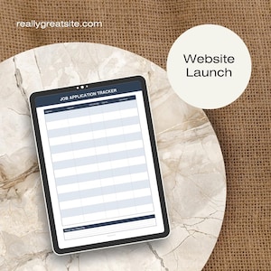 May include: A digital tablet displaying a Job Application Tracker template with columns for company, position, date applied, status, and follow-up. The screen shows the text reallygreatsite.com and a circular graphic with Website Launch.