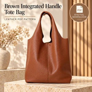 May include: A brown leather tote bag with an integrated handle design. The text on the image reads: Brown Integrated Handle Tote Bag, LEATHER PDF PATTERN, and PDF DIGITAL DOWNLOAD.
