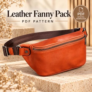 May include: A rust-colored leather fanny pack with a dark brown adjustable strap, a top zipper closure, and metal hardware. The text "Leather Fanny Pack PDF PATTERN" and "PDF DIGITAL DOWNLOAD" is visible above the bag.