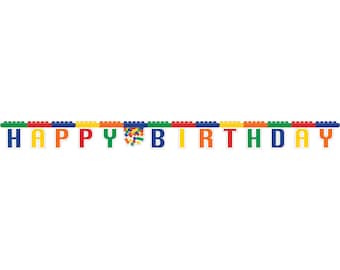 May include: A colorful banner with the words "HAPPY BIRTHDAY" in bold, block letters. The letters are in various colors, including blue, yellow, red, and green. The banner is decorated with small, colorful building blocks.